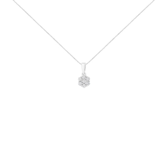 Front angle view of a white metal necklace with a round cluster pendant featuring prong-set white gemstones.