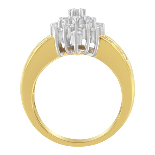 Front angled view of a yellow metal ring featuring a cluster of white round gemstones in prong settings and white baguette gemstones in channel settings on the top.