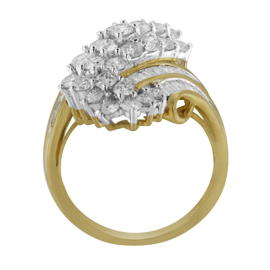 Top angle view of a yellow ring with cluster of prong-set round white gemstones and channel-set baguette white gemstones.