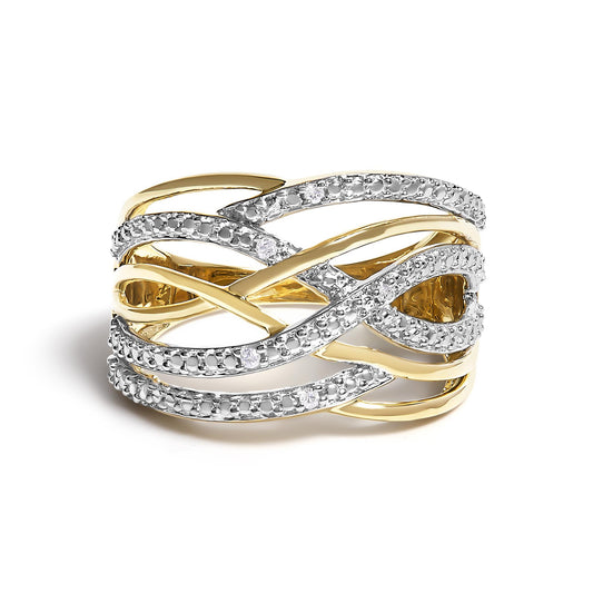 Yellow metal ring with an intertwined design featuring white round pave-set gemstones, shown from a front angle.