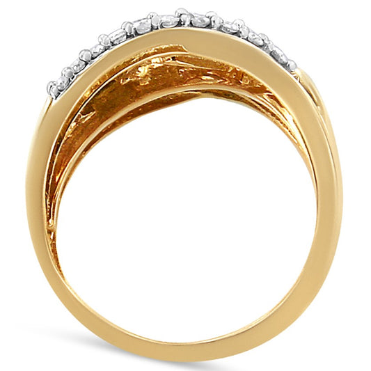 Close-up side view of a yellow and white ring featuring white round gemstones in prong settings and white baguette gemstones in a channel setting.