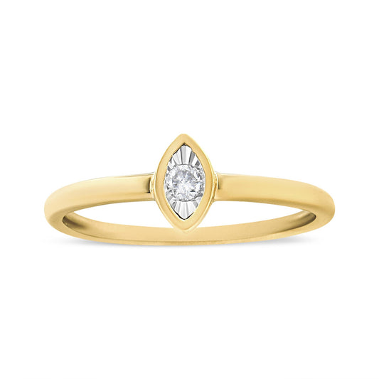 Front angle of a yellow ring featuring a single round white gemstone in a marquise-shaped setting.