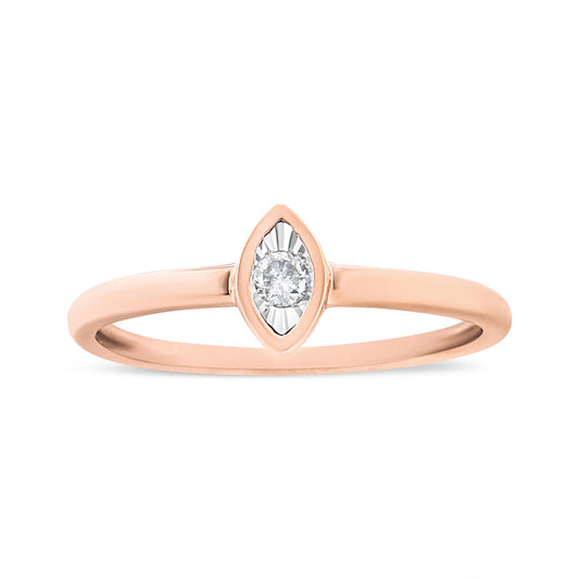 Front view of a rose-colored ring with a single round white gemstone in a miracle setting.