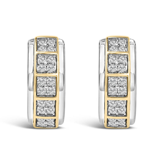 Front view of a pair of hoop earrings with alternating yellow and white metal sections, featuring multiple clusters of round white gemstones in prong settings along the front.