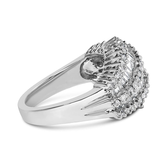 White metal ring with a raised cluster design featuring white round gemstones in prong settings surrounding white baguette gemstones in channel settings, shown at a side angle.