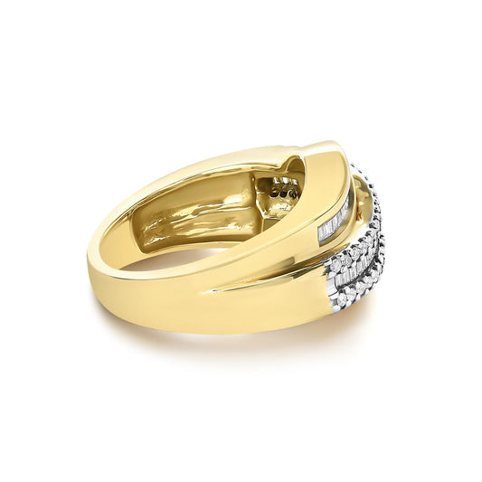 Close-up angled view of a yellow metal ring featuring two rows of white gemstones; one row with round gemstones in prong settings and the other with baguette gemstones in channel settings.