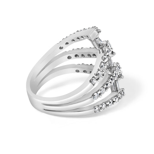 White metal ring with a triple band design, set with round white gemstones in prong settings and baguette-shaped white gemstones in channel settings, shown at an angled side view.