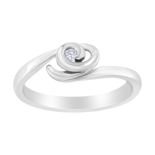 White metal ring with a swirl design holding a single round white gemstone in a bezel setting, shown from an angled side view.