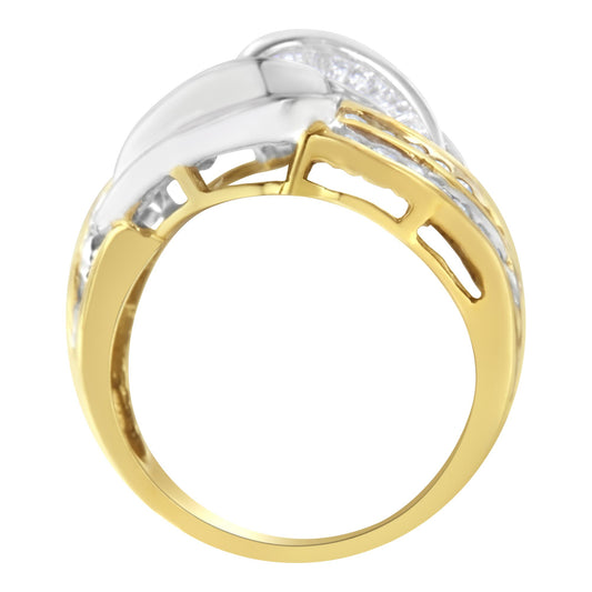 Close-up side view of a two-tone ring with yellow and white metal featuring channel-set round and baguette white gemstones.