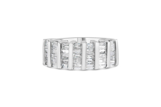 White metal ring with channel-set baguette-shaped white gemstones, front angled view on a white background.