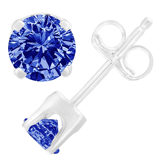 Close-up front and side view of a pair of white metal stud earrings with round blue gemstones in prong settings.