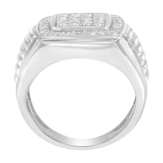 Front angle of white metal ring with prong-set round white gemstones arranged in rectangular and surrounding patterns on top and decorative ridges on the sides.