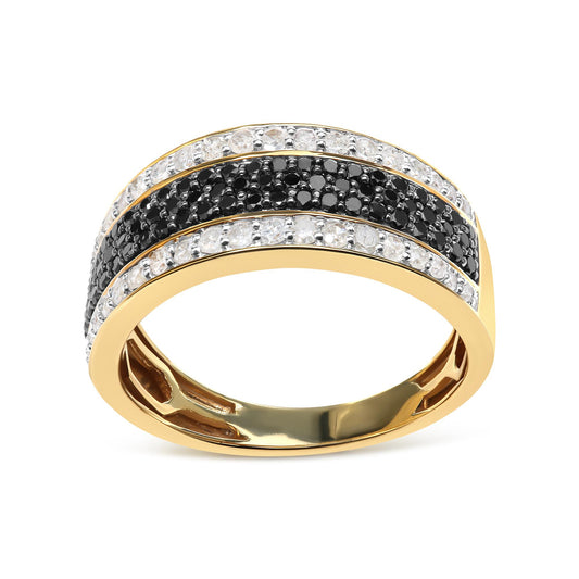 Yellow metal ring with three rows of prong-set round white and black gemstones, shown in a front angled close-up.