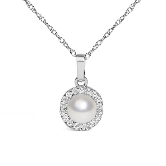 White metal necklace with a round pendant featuring a central pearl surrounded by a halo of white gemstones in a pave setting, shown in a close-up front view.