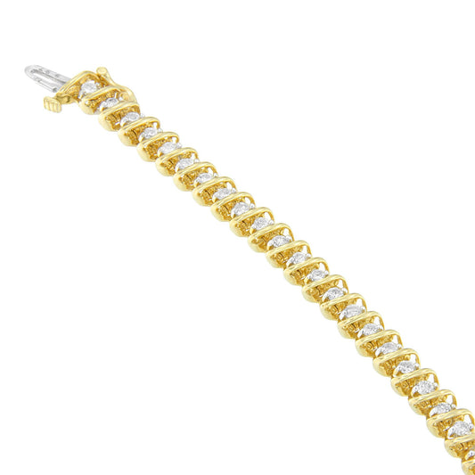 Close-up angled view of a yellow bracelet featuring round white gemstones in prong settings along its length.