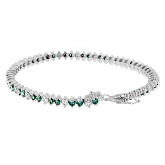 White metal bracelet with alternating round white and blue gemstones in prong settings, shown in a slightly angled side view.