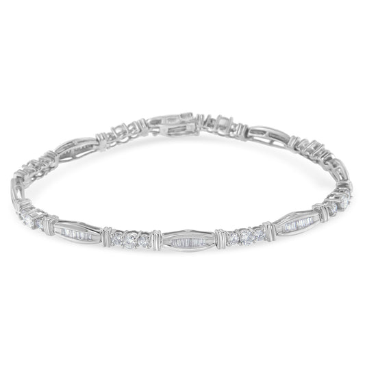 White metal bracelet with alternating round prong-set and baguette channel-set white gemstones, shown flat from a front angle.