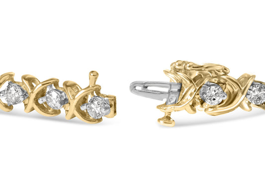 Close-up front and side view of a yellow metal bracelet featuring round white gemstones in prong settings and baguette white gemstones in channel settings.