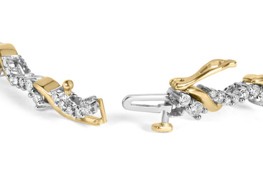 Close-up front angle of a yellow and white metal bracelet with round white gemstones in prong settings, showing the clasp open.