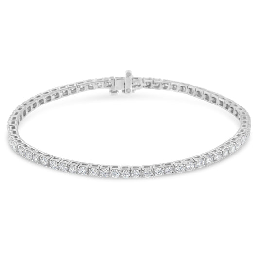 White metal bracelet with round white gemstones in prong settings, shown from a slightly elevated front angle.