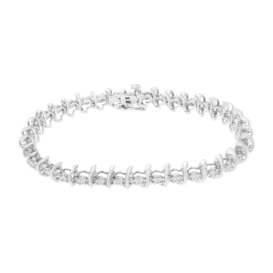 White metal bracelet with round white gemstones in prong settings, shown from a top angled view.