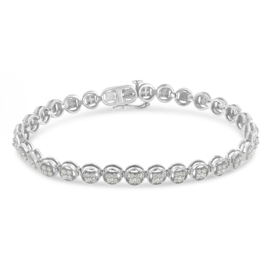 White metal bracelet with round white gemstones in prong settings, shown in a front angle view.