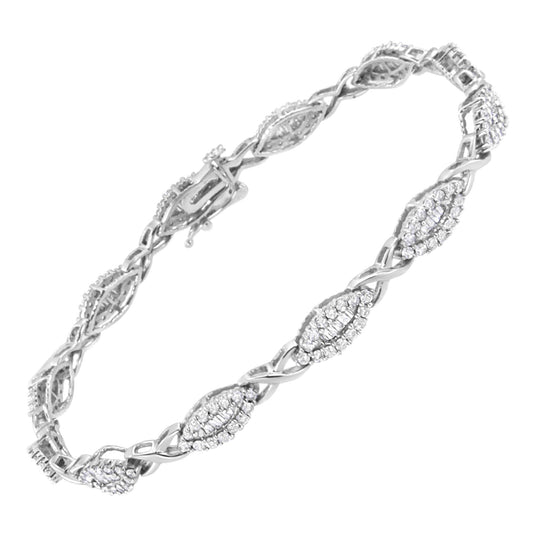 White metal bracelet with alternating oval-shaped sections featuring round white gemstones in pave setting and baguette white gemstones in channel setting, shown from a top angle.