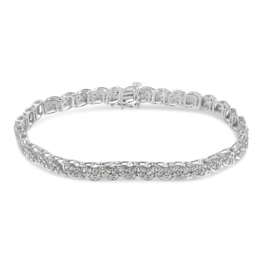 White metal bracelet with round white gemstones in prong settings, shown from a slightly elevated front angle.