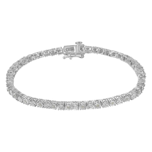 White metal bracelet with round white gemstones in prong settings, shown at a slight angle.