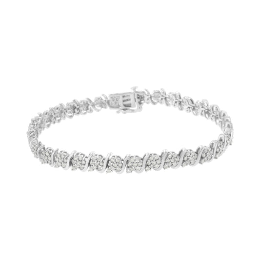 White metal bracelet with round white gemstones in prong settings, shown from a front angle.