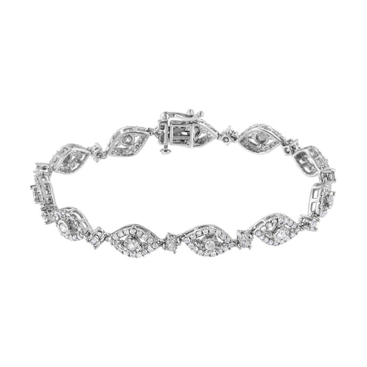 White metal bracelet with round white gemstones in miracle and prong settings, shown in a top-down view.