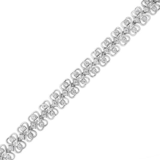 White metal bracelet with round white gemstones in miracle setting, shown from a top angle.