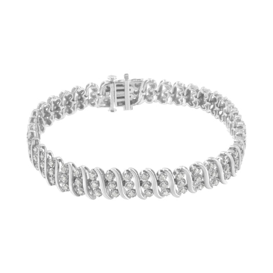 White metal bracelet with round white gemstones in prong settings arranged in a repeating pattern, shown from a slight top angle.