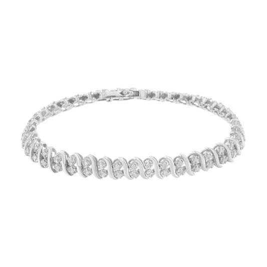 White metal bracelet with round white gemstones in pave setting, shown from a front angled view.