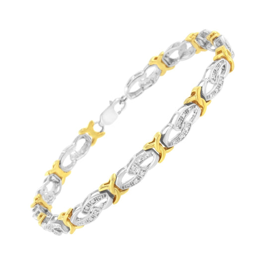 Angled view of a two-tone bracelet featuring alternating yellow and white metal links with white round gemstones set in a channel setting.