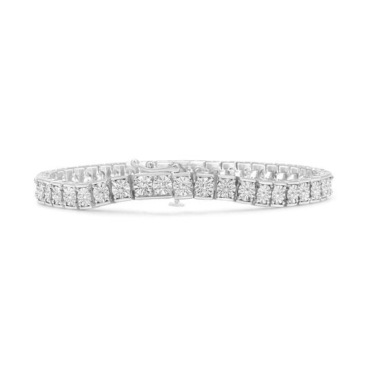 White metal bracelet with round white gemstones in miracle setting shown from front angle.