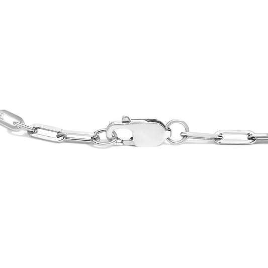 Close-up front angle of a white metal link bracelet with an oval clasp, shown against a white background without gemstones visible.