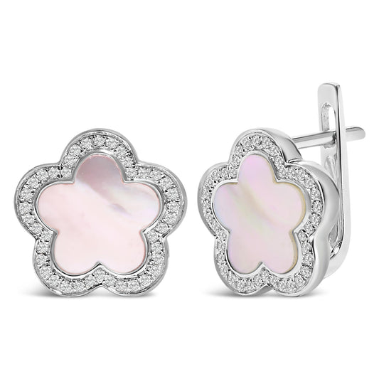 Close-up front and side view of white metal flower-shaped earrings with a white mother of pearl center surrounded by micro-pave set white gemstones, shown on a white background.
