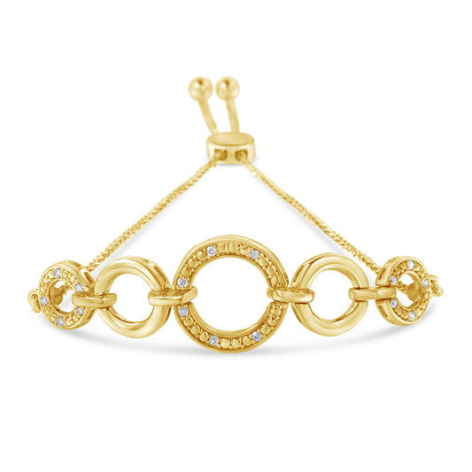 Front angle view of a yellow bracelet with interconnected circular links, some adorned with small white gemstones in pave setting, and an adjustable slider clasp.