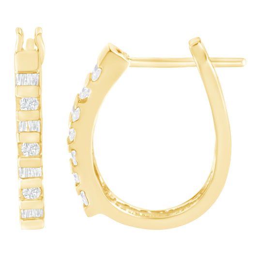 Close-up front and side views of yellow metal hoop earrings with white round and baguette shaped gemstones in a channel setting.