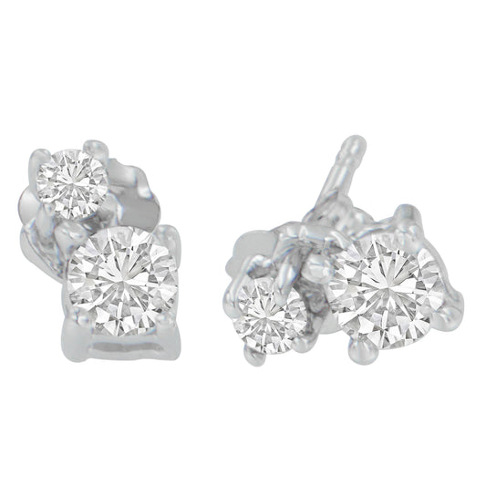 Close-up front angle of white metal stud earrings each with two prong-set round white gemstones.