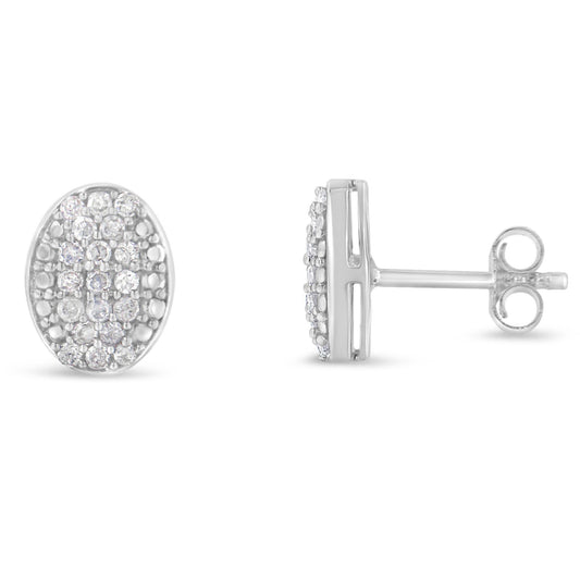 Pair of white metal oval stud earrings with round white gemstones in prong settings, shown from front and side angles.