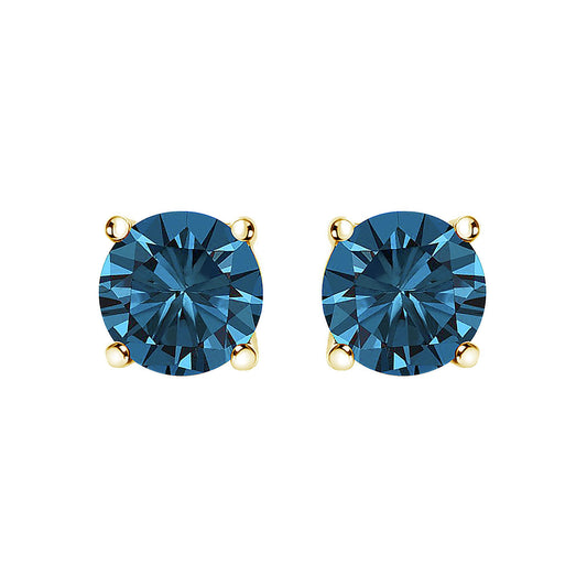 Pair of yellow metal stud earrings with round blue gemstones in 4-prong settings, shown from front angle.