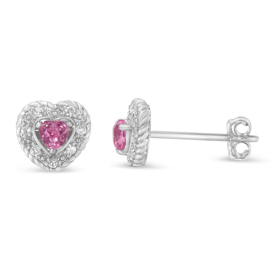 Front and side view of a pair of white earrings with heart-shaped pink gemstones surrounded by round white gemstones in a pave setting.