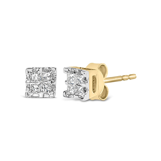 Pair of yellow metal stud earrings with square clusters of white princess-cut gemstones in invisible setting, shown in close-up angled view.