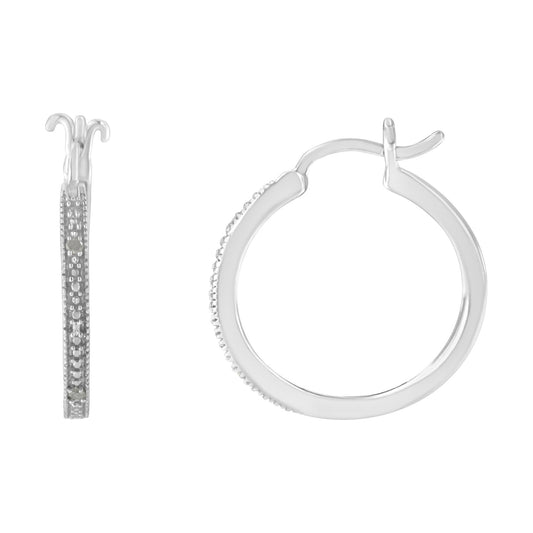 White hoop earrings with round white gemstones in pave setting shown from front and side angles.