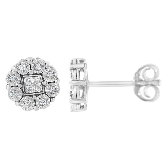 Front and side views of white metal stud earrings featuring a cluster of round white gemstones in miracle setting surrounding princess-shaped white gemstones in invisible setting.