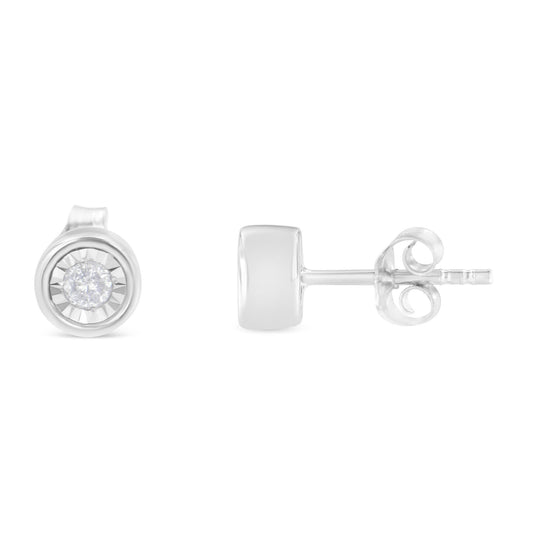 Front and side view of white metal stud earrings with round white gemstones in miracle setting, isolated on white background.