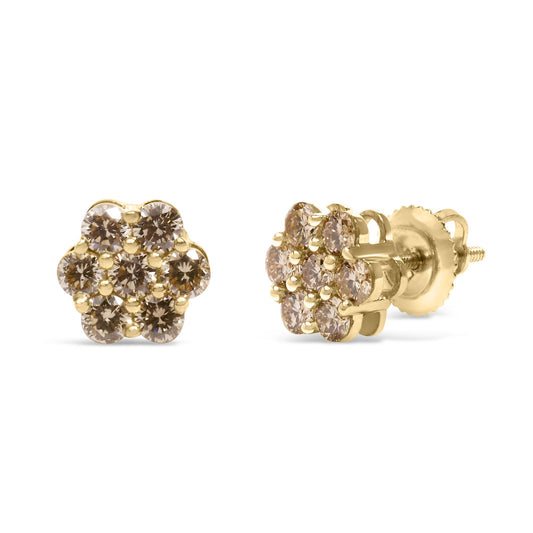 Pair of yellow metal stud earrings with round white gemstones in prong settings arranged in a flower shape, shown from front and side angles.