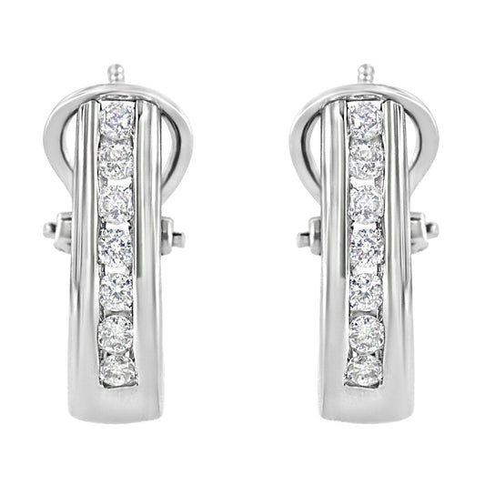 Front-facing view of white metal earrings with a vertical row of round white gemstones in channel setting.